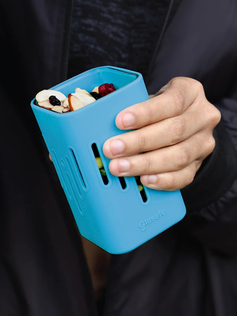 A borosilicate glass kitchen container with silicone sleeve