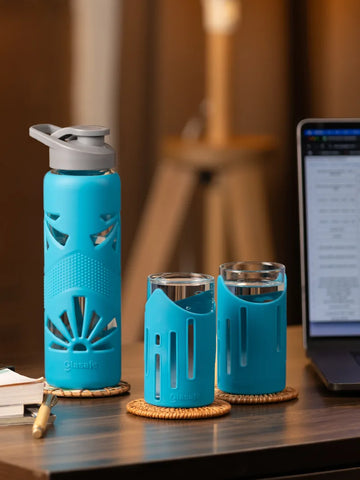 Set of water glasses and bottle